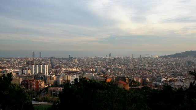 Barcelona skyline at Sunset. Time lapse.
