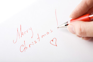 hand writing Merry Christmas