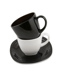 Black and white cups isolated on white