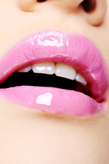 Naklejka premium female lips with bright pink lipstick