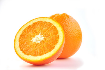 Juicy oranges on white.