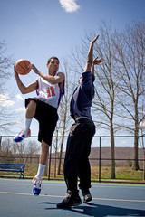 Fototapeta premium Men Playing Basketball