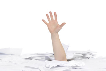 hand drowning in paper work