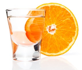 Alcoholic drink and orange