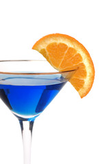 Blue cocktail with a fruit garish