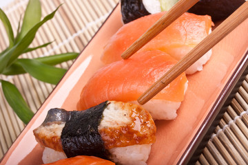 Sushi with chopsticks
