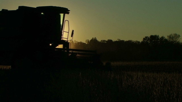 Combine Silhouette At Sunset
