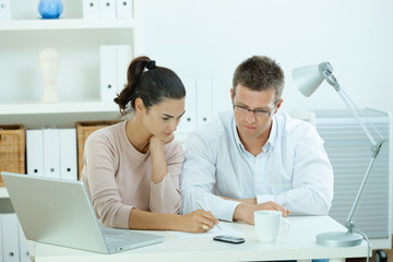 Obraz premium Couple working at home