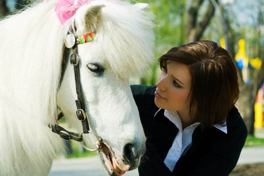 Young woman and pony.