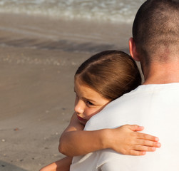 Daughter hugging her father