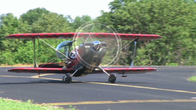 Biplane Taxiing with Smoke
