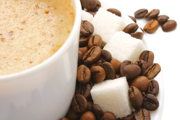 Cup coffee ,sugar and coffee-beans.
