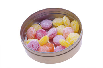 caramel sweets in tin box isolated on white