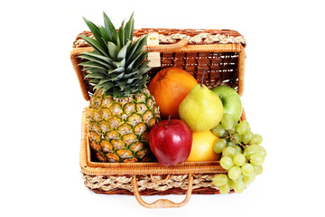 Fototapeta na wymiar picnic basket with fruits