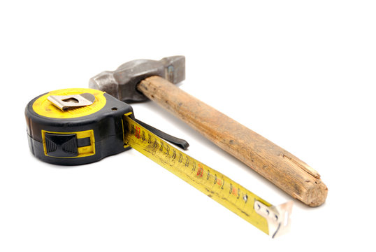 Work tool series: Old tape measure and hammer