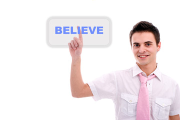 Young business man pressing the believe key