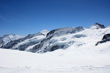 Fototapeta na wymiar Eternal snow on the top of Jungfrau
