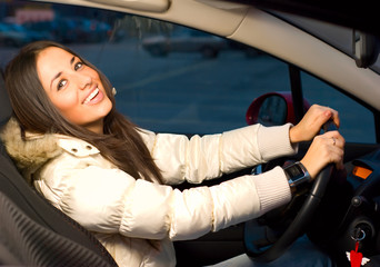 young woman in her car