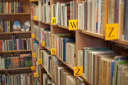 Shelves of books in library (shallow focus)