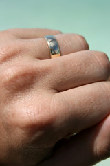 Fototapeta premium wedding ring on male hand