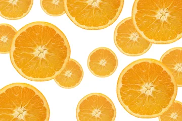 Fotobehang Plakjes fruit Vallende stukjes sinaasappel