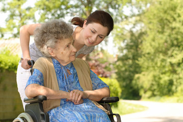 Obraz premium Senior woman in a wheelchair