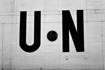 The United Nations sign on the board of the aircraft