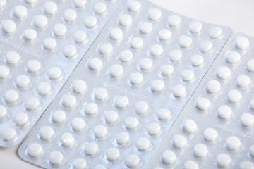 white pills vitamin