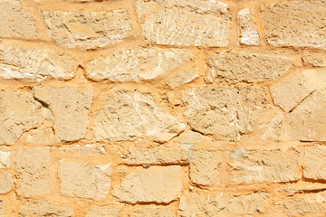 Stone Wall Background During the Bright Day