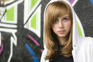 Teenage girl on graffiti background