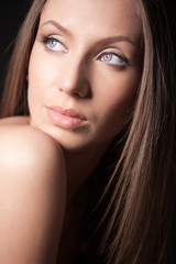Obraz premium Portrait of attractive brown-haired girl