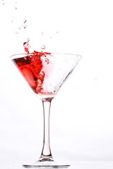 red cocktail on white