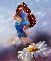 Elfe femelle voler avec fleur de camomille