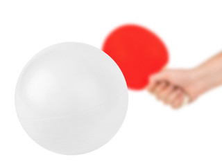 Hand with tennis racket and ball