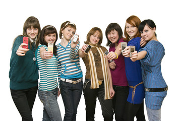 Group of the girls showing mobile phones