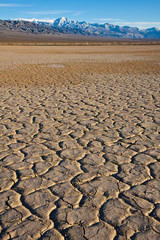 Fototapeta premium Dry Earth and Snow Peaks