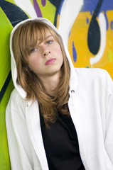 Teenage girl on graffiti background