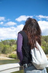 Fototapeta na wymiar woman backwards with rucksack