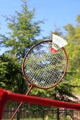 Playing badminton outdoors