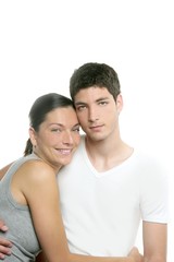 Fototapeta premium Beautiful young fresh modern couple hug on white