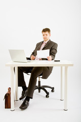 Young business man working in office