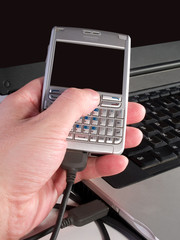 sync personal digital assistent with laptop