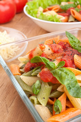 servings of colored penne pasta