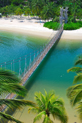 Wooden suspension bridge to paradise