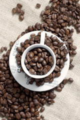 Coffee cup with coffee beans