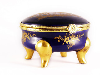 Old gold-blue jewelry box on white