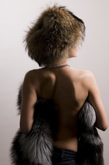 beautiful woman in the fur coat