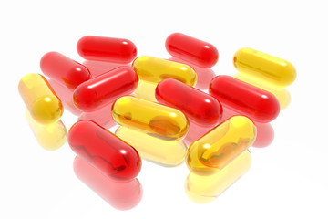 red and yellow pills on white background