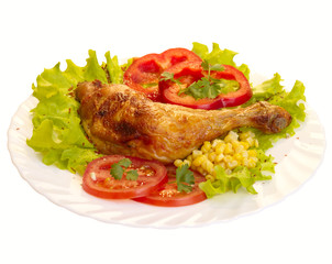 grilled chicken leg with vegetables. isolated with clipping path