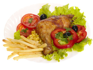 grilled chicken leg with vegetables and chips. iolated with clip